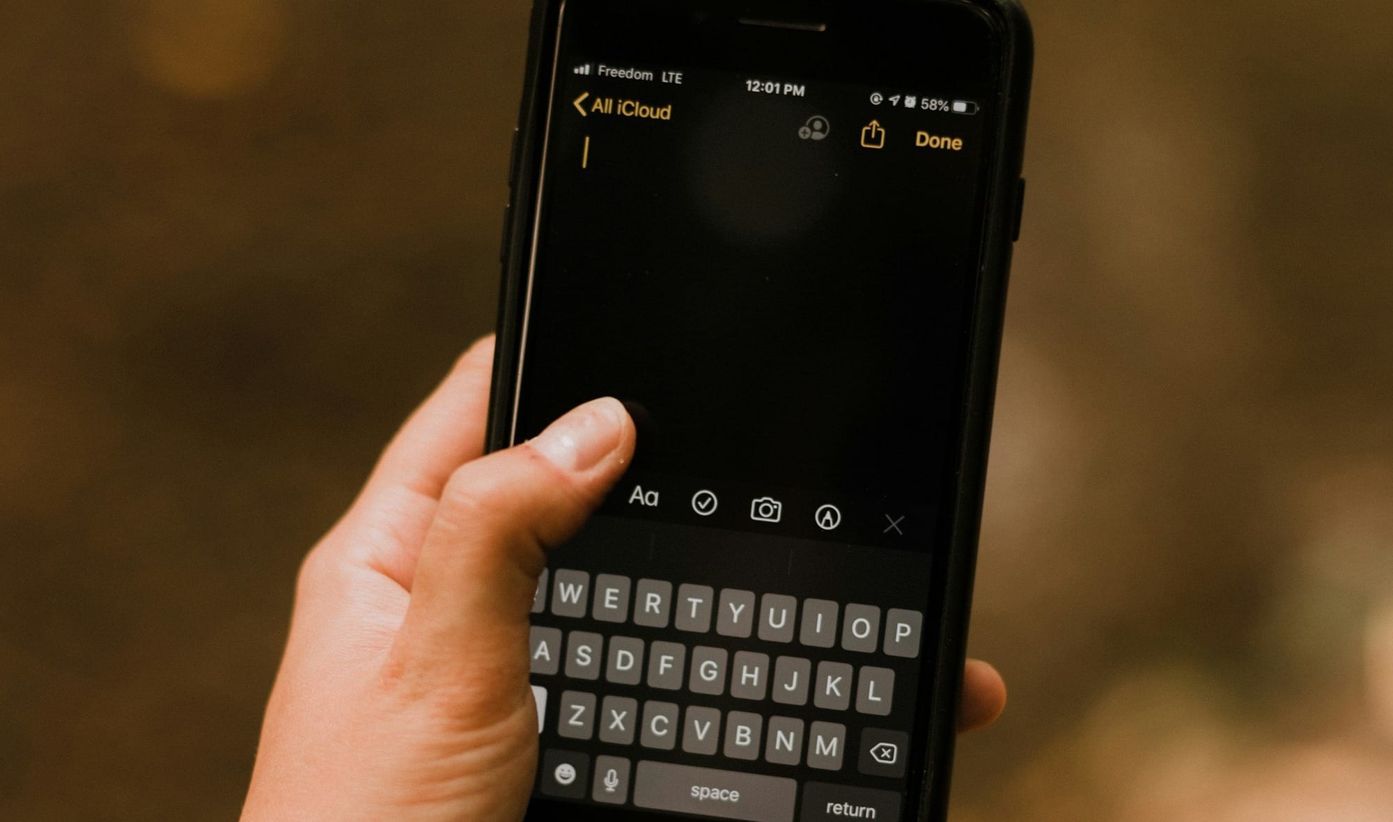 person holding black android smartphone