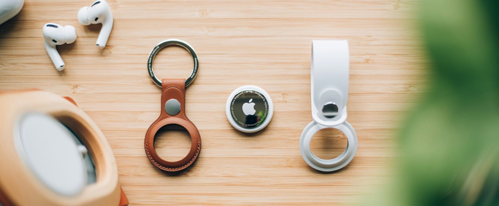 white and orange magnifying glass on brown wooden table